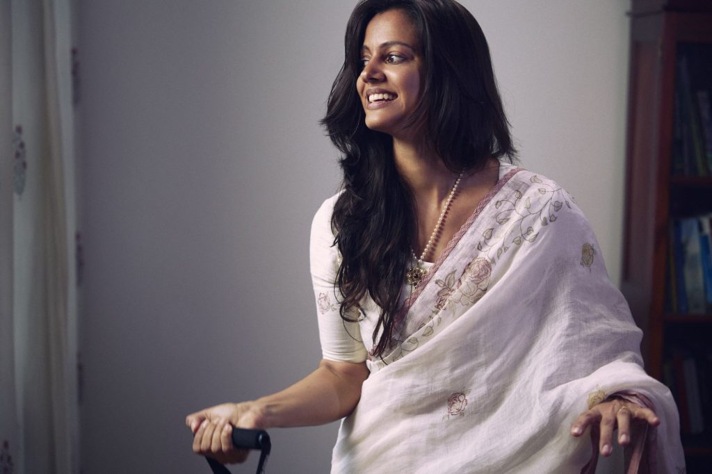 Founder of Kuppameniya Melanie Daetwyler-De Silva showcases a sari from the Anavila
collection