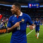 Kylian Mbappé celebrates after France beat Sweden in the FIFA World Cup knockout stage.