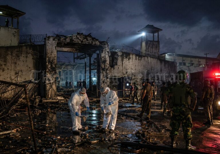 Forensic investigators examining evidence after the deadly Negombo prison riot