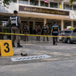 Police investigate the Nonthaburi shooting at a local government office near Bangkok after a senior Thai official was killed