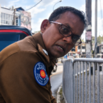 Padukka police officer involved in a heated confrontation with a civilian during a traffic stop