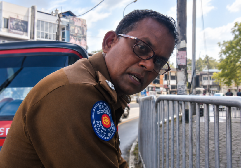 Padukka police officer involved in a heated confrontation with a civilian during a traffic stop