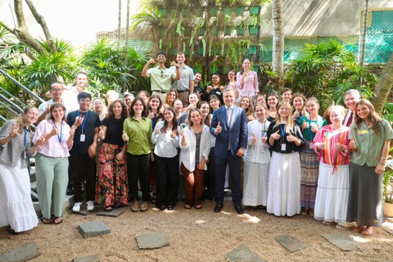 U.S. Ambassador to Sri Lanka Eric Meyer and the 34 new Peace Corps Volunteers