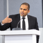 Harin Fernando delivering his keynote address at NavaDisha Global Dialogue in Karnataka, India