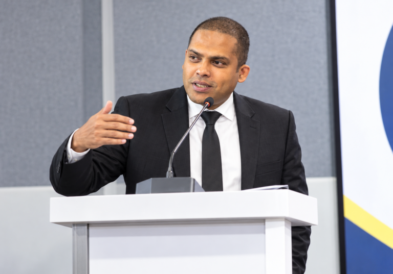 Harin Fernando delivering his keynote address at NavaDisha Global Dialogue in Karnataka, India