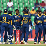 Sri Lankan cricketers amid green stadium seats